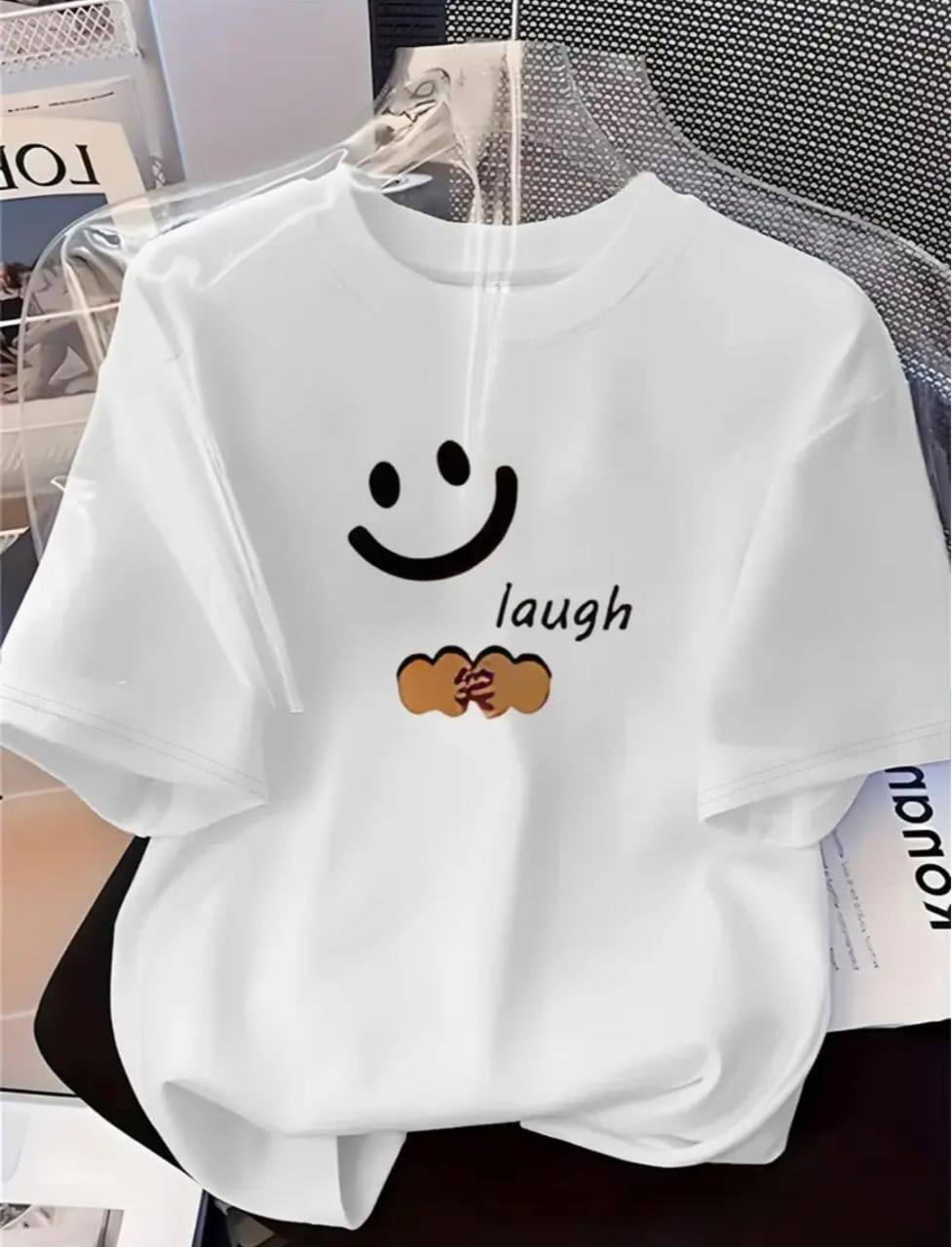 WHITE T-SHIRT WITH 'LAUGH' PRINT