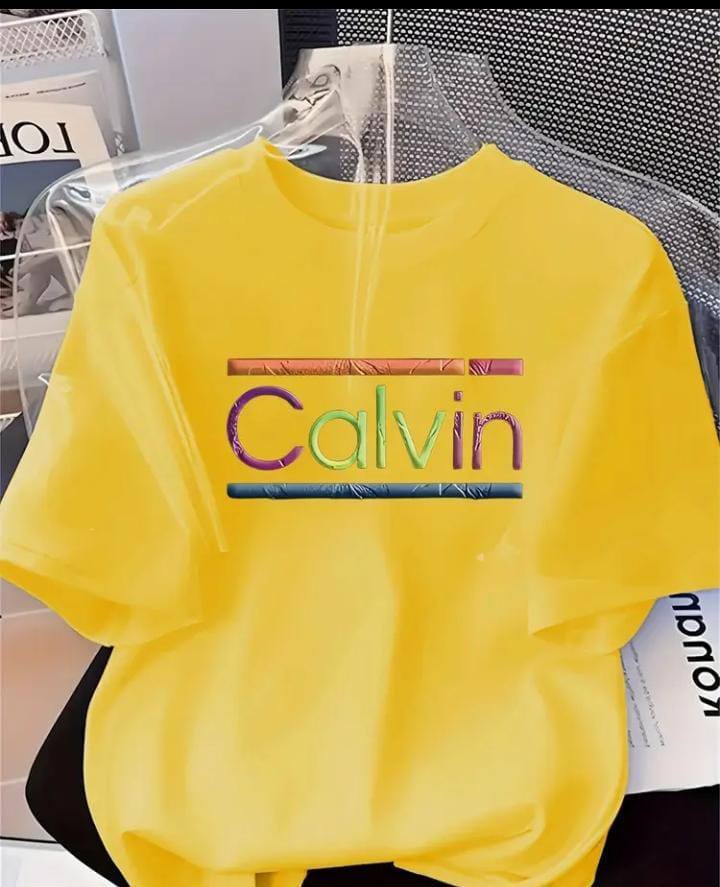 YELLOW TEE WITH 'CALVIN' PRINT