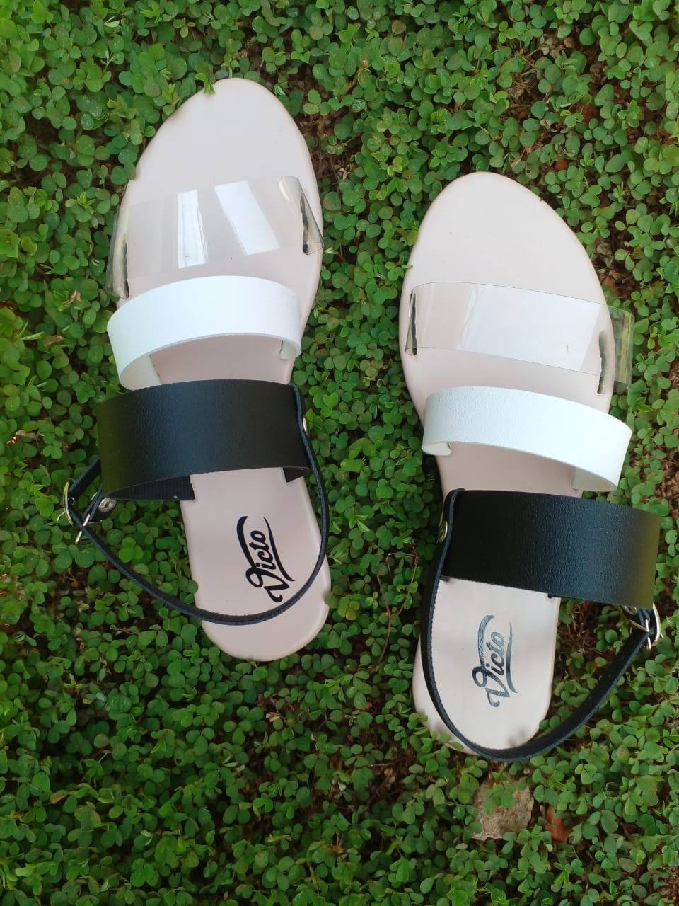 BLACK AND WHITE SLIPPERS