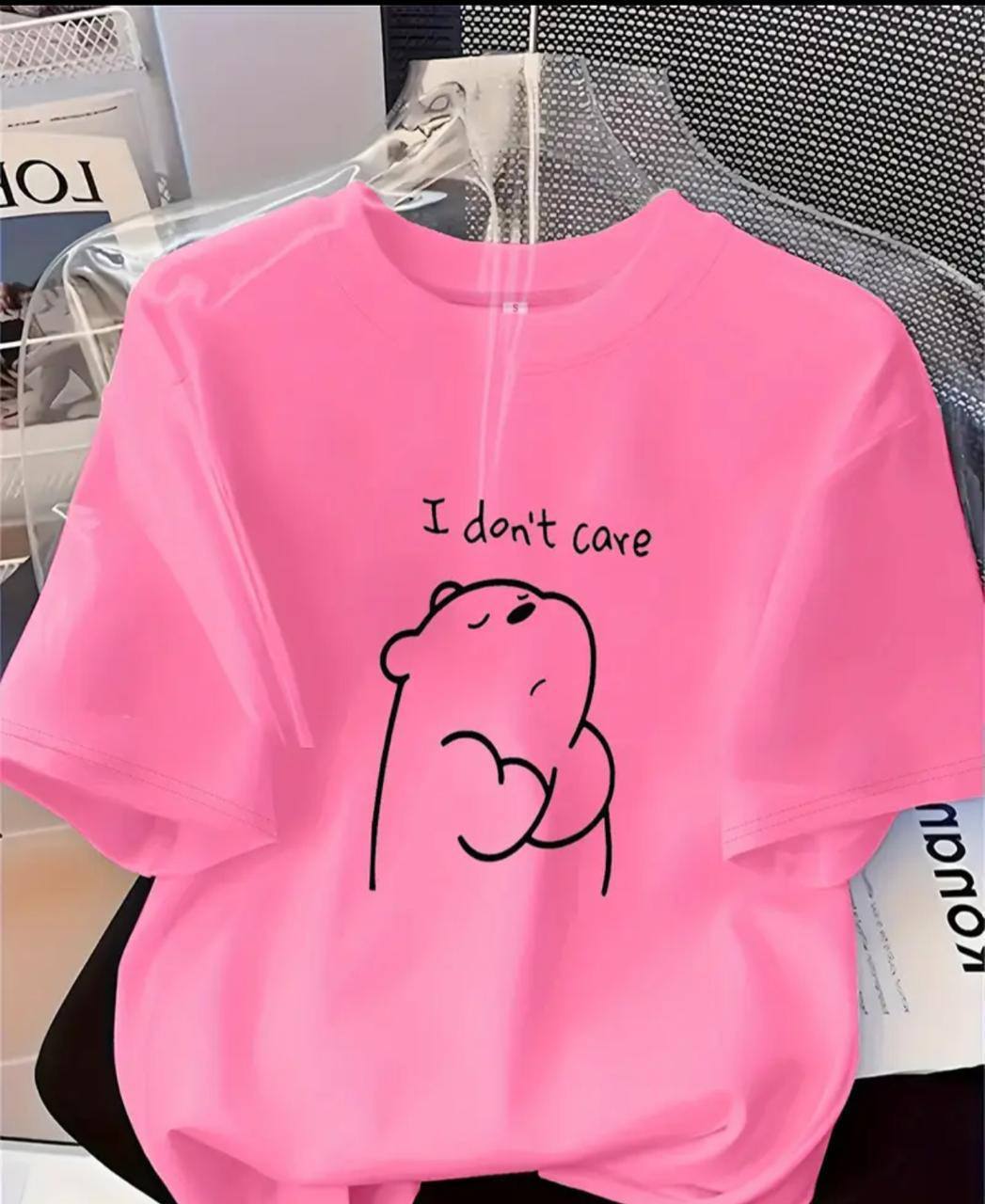 PINK TEE WITH 'I DON'T CARE' PRINT