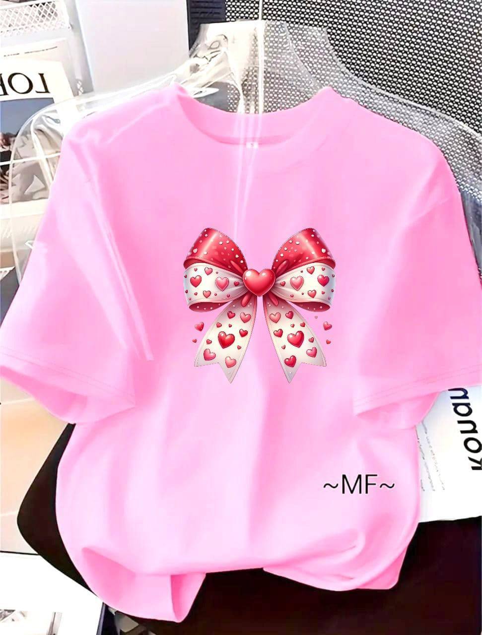 PINK TEE WITH BOW DESIGN
