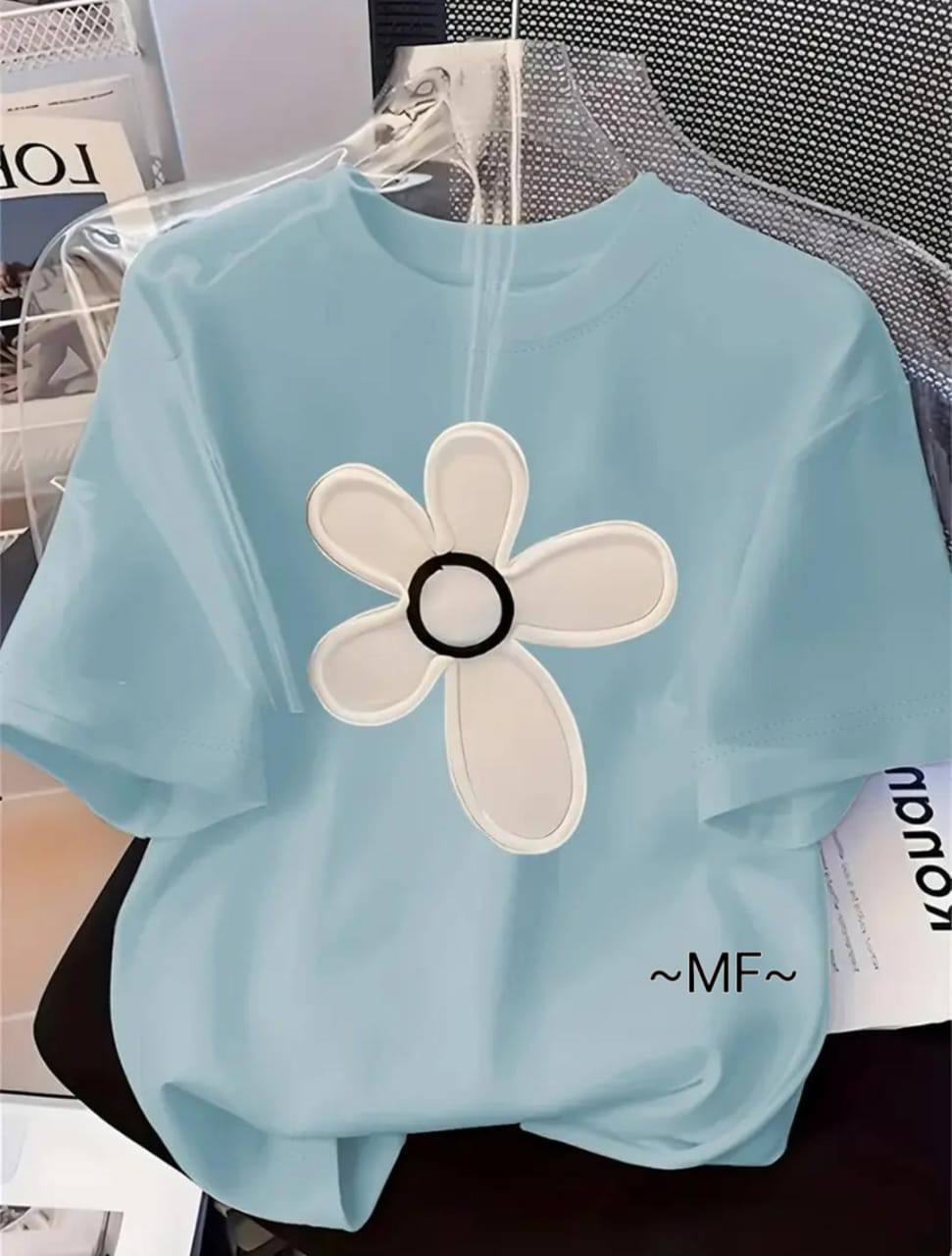 LIGHT BLUE TEE WITH A FLORAL PRINT