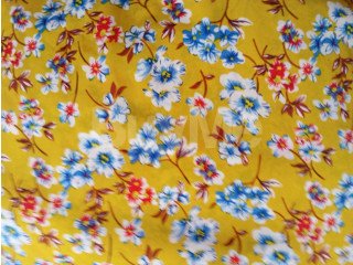 LADIES CLOTHING DESIGN - YELLOW WITH PRINTED FLOWER DESIGN