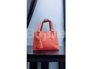 ORANGE LADIES HANDBAG DESIGN