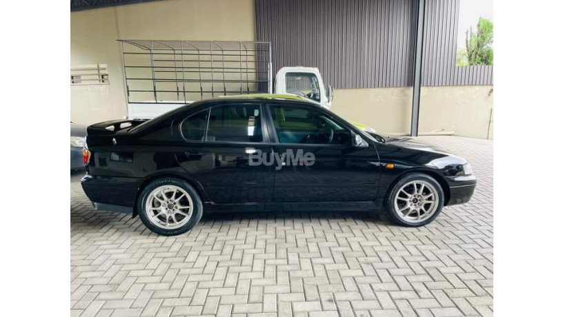 nissan-primera-p11-big-3