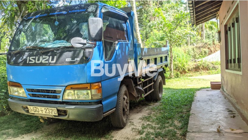 isuzu-tipper-4hf1-2002-big-0