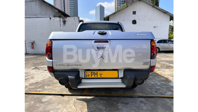 rent-a-car-mitsubishi-l200-double-cab-long-term-only-big-1