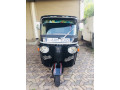 bajaj-re-three-wheel-2013-small-0