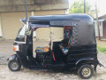 bajaj-re-three-wheel-2013-small-2